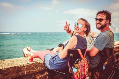 Young man and woman enjoying their trip