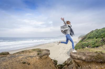 1056323320 Woman Having Fun At The Beach