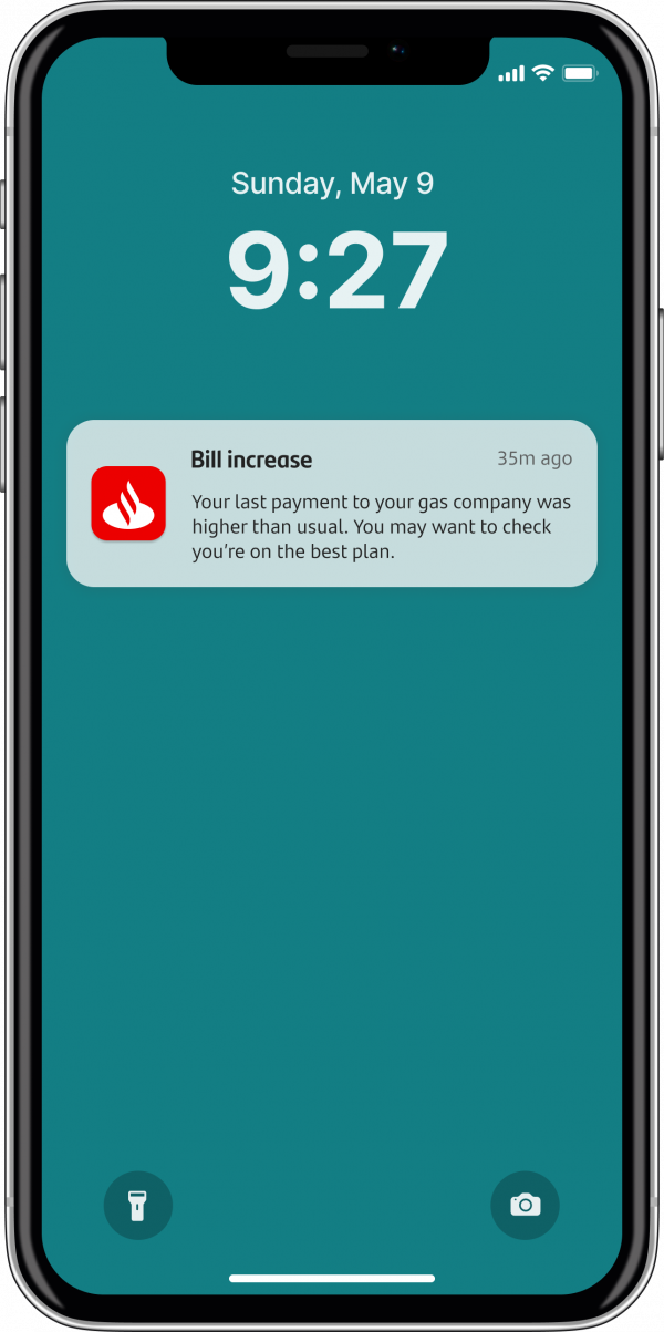 A screenshot of a mobile lock screen with a ‘Bill increase’ notification from Santander My Money Manager on it