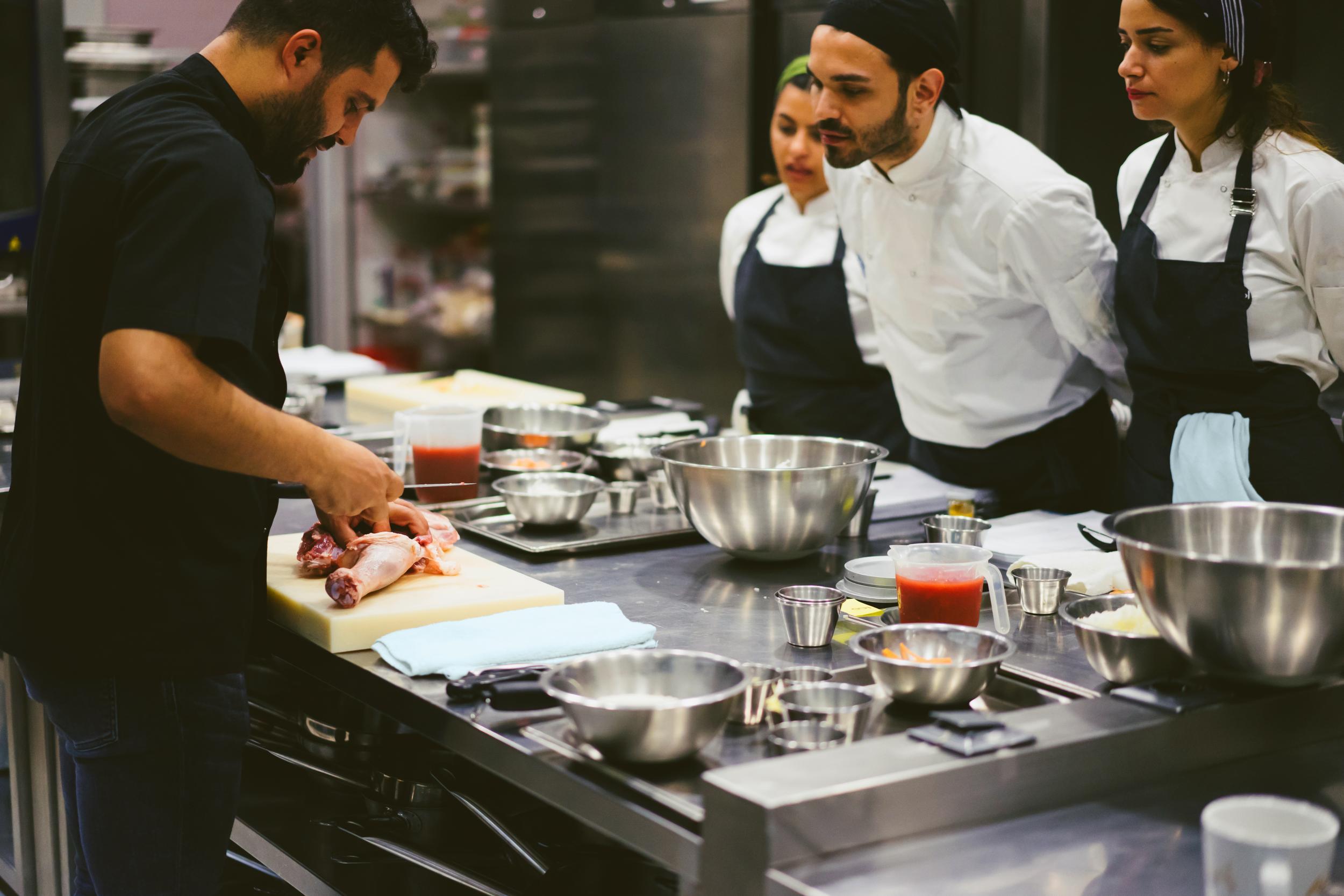 the chef describes the techniques of cutting meat
