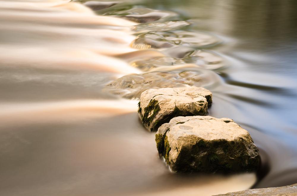 Golden stepping stones in a river; Shutterstock ID 198574307; Studio: Digital GPS; PO: 905543578; Client: Santander; Other: Petra Begojev